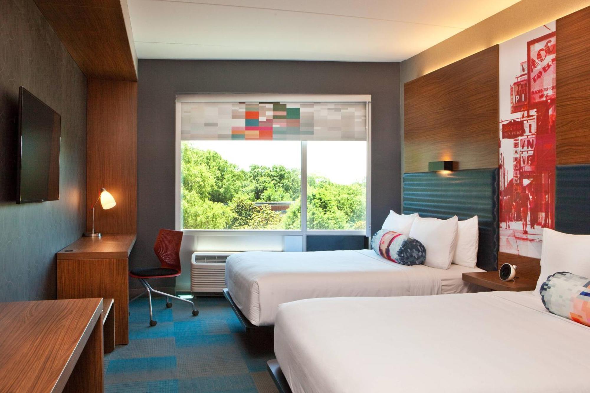 Отель Aloft Роли Экстерьер фото